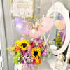 Beautiful bubble balloon &ldquo;happy Mother&rsquo;s Day&rdquo;  filled with spring flowers that