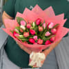 25 tulips 
Hand-tied mix of pink, red, white, orange  tulips in