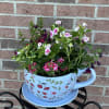 This lovely keepsake blue, burgundy, red, pink &amp; green ceramic floral print