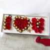 Deep red roses formed into heart-shaped clusters make an immediate romantic statement-perfect