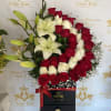 A dramatic red-and-white bouquet arranged in a sleek black gift box-this Half
