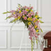 Rejoice with this softly dramatic cascade of pink and yellow blooms -