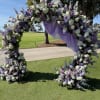A dreamy floral arch designed to transform your ceremony into a fairytale