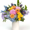 A soft mix of pastel blooms in pink lavender yellow, and blue