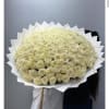 Large bouquet of cream roses wrapped in white paper