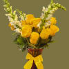 Bright yellow roses gathered into a rounded cluster make an immediate sunny