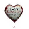 A glossy heart-shaped foil balloon that says "I love you mom" and
