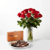 Standard 12 red roses in vase. Includes assorted chocolate box. 