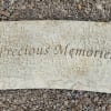 Stone memorial plaque engraved with 