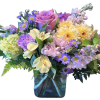 Blushing Meadow Garden is a soft and graceful floral arrangement filled with