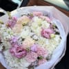 An ultra-soft and luxurious bouquet designed in delicate blush pink and creamy
