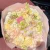A delicate and refined bouquet designed in soft pastel tones of blush