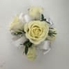 Wrist corsage with white ribbon/tulle and white baby roses
