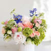 A soft, elegant Mother&rsquo;s Day arrangement in blush pink, creamy white, and