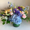 A beautiful combination of blue hyacinth from Holland, lush blue hydrangea and