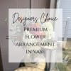 Mixed flower arrangement in a clear vase with white and pastel blooms