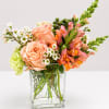 As if gathered in a single, thoughtful moment, this arrangement brings together