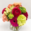 A vibrant interplay of bold pinks, fresh greens, and luminous coral tones