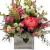 Coral Meadow Charm is a fresh and enchanting floral arrangement inspired by