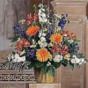 Send this bright arrangement with its vivid, cheerful colors and your sentimental