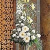 With its striking array of white flowers, this arrangement will fill any
