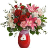 Turn on the charm with romantic roses, fragrant lilies, and this stunning