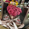 Roses shaped into heart, chocolates and diamonds