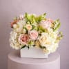 A bright mixture of blooms in a wood box is always a