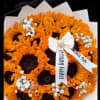 Beautiful bouquet of seasonal sunflowers in buchon style long stems wrapped with