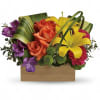 Send her a rainbow! Golden lilies, radiant roses and regal alstroemeria burst