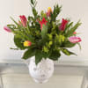 It captures the fresh, lively energy of the tulips with their blend