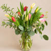 10 mixed tulips with nice greenery and filler flower