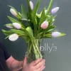 A fresh cluster of pastel tulips creates a gentle spring moment -