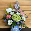 This arrangement is "Pitcher Perfect" for showing love to any mom! In