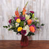 Bright, cheerful colors take center stage in this flower arrangement for Mother's