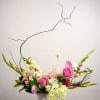A sculptural expression of softness and movement, Spring Fling blends romantic garden