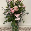 Tall, garden-style mix of pink roses, spray roses and mini carnations in