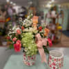 A lush pale green hydrangea crown sets the tone for this spring