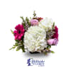 Bouquet of white hydrangea, pink gerberas, and lavender roses