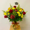 This Arrangement includes Red Roses, Yellow Daises, Red Alstroemeria, Yellow Solidago, Greenery