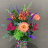 A burst of pink, coral and purple garden-fresh blooms that reads like