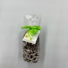 Bag of chocolate-covered pretzels tied with a green ribbon