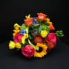 This arrangement features a mix of roses, mini calla lilies, sunflowers, hydrangea