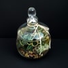 A tiny slice of green calm, the Hobbiton Terrarium is a glass-encased