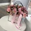 Fresh blooms in a chic floral bag - elegant, unique, and ready
