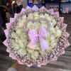 50 white roses with pink accents 
