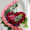 Mixed bouquet of pink and red roses with lilies in a birthday box