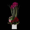 A vertical, romantically bold arrangement that reads like a declaration: dense red