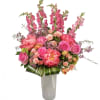 Snapdragons, peonies, spray roses, roses, wax flower, tulips designed tall.