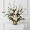 Pale pink roses and alstroemeria with white hydrangea and greenery, arranged tall
